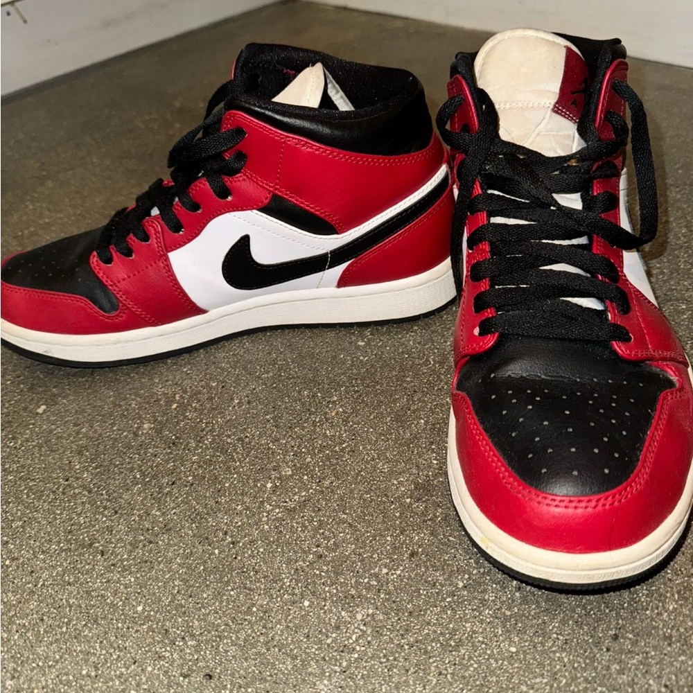 Nike Red and Black Sneakers with Iconic Design